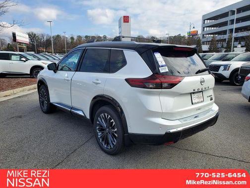 Everest White Pearl/Super Black 2026 Nissan Rogue Platinum