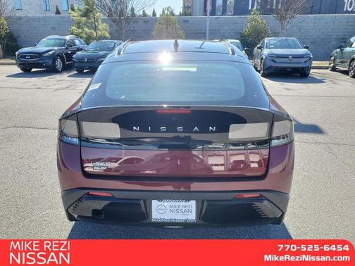 Coulis Red Metallic/Black 2026 Nissan Leaf PLATINUM+