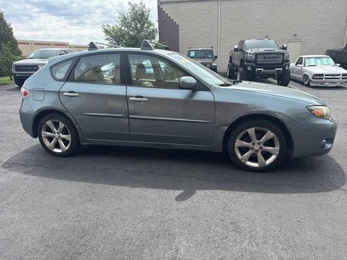 Teal 2011 Subaru Impreza Outback Sport Base