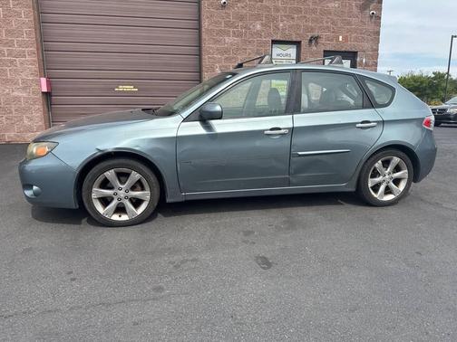 Teal 2011 Subaru Impreza Outback Sport Base