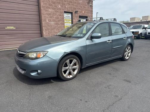 Teal 2011 Subaru Impreza Outback Sport Base