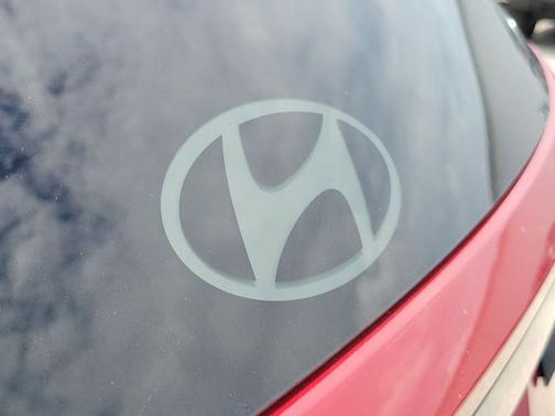 Red 2025 Hyundai TUCSON SEL