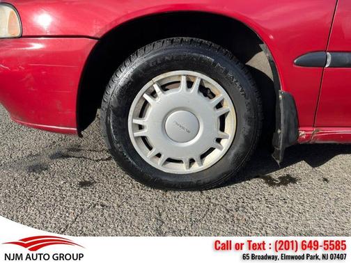 Red 1996 Subaru Legacy Base