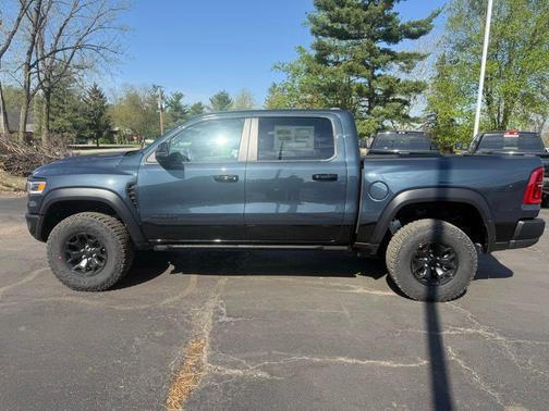 Forged Blue Metallic 2026 RAM 1500 RHO Crew Cab 4x4 5'7' Box