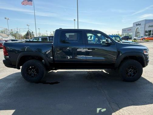 Forged Blue Metallic 2026 RAM 1500 RHO Crew Cab 4x4 5'7' Box
