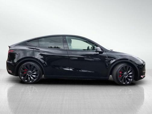 Solid Black 2024 Tesla Model Y Performance Dual Motor All-Wheel Drive