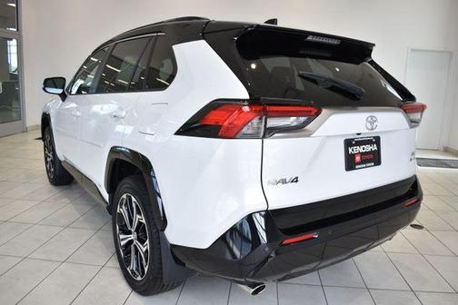 Beige 2025 Toyota RAV4 Hybrid SE