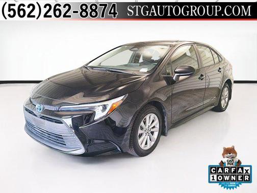 Midnight Black Metallic 2025 Toyota Corolla Hybrid SE