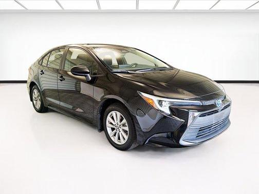 Midnight Black Metallic 2025 Toyota Corolla Hybrid SE
