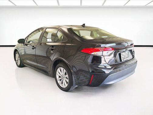 Midnight Black Metallic 2025 Toyota Corolla Hybrid SE