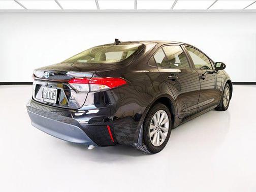 Midnight Black Metallic 2025 Toyota Corolla Hybrid SE