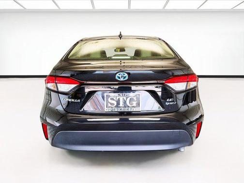 Midnight Black Metallic 2025 Toyota Corolla Hybrid SE