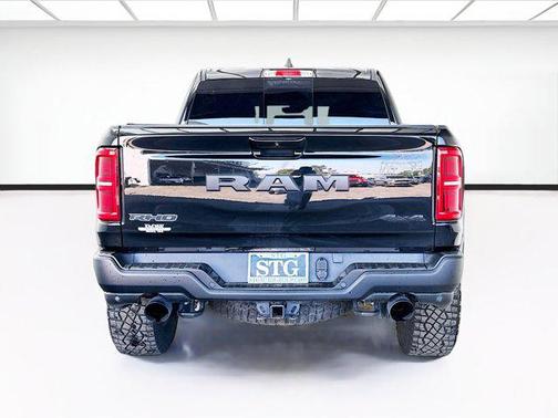 Diamond Black Crystal Pearlcoat 2025 RAM 1500 RHO Crew Cab 4x4 5'7' Box