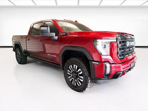 Volcanic Red Tintcoat 2024 GMC Sierra 2500 AT4