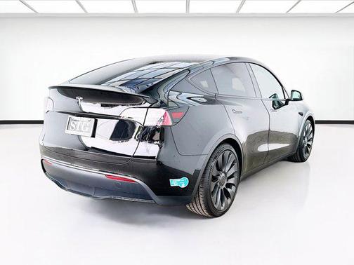 Solid Black 2025 Tesla Model Y Performance Dual Motor All-Wheel Drive