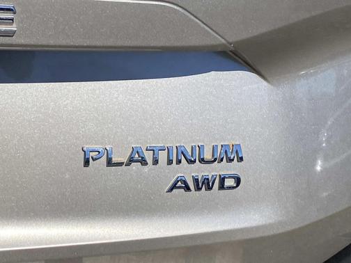 Gold 2022 Nissan Rogue Platinum