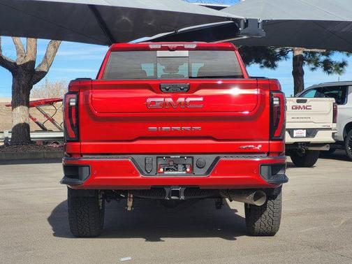 Volcanic Red Tintcoat 2026 GMC Sierra 2500 AT4