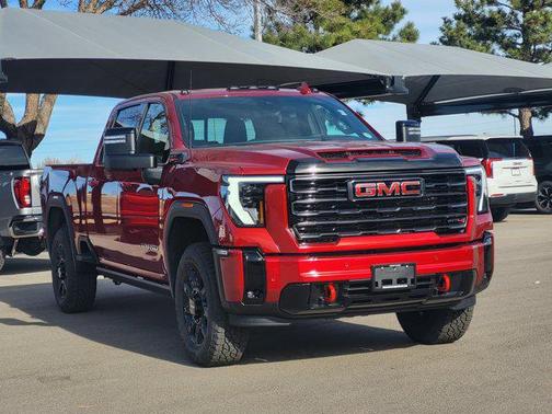 Volcanic Red Tintcoat 2026 GMC Sierra 2500 AT4