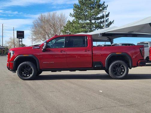 Volcanic Red Tintcoat 2026 GMC Sierra 2500 AT4
