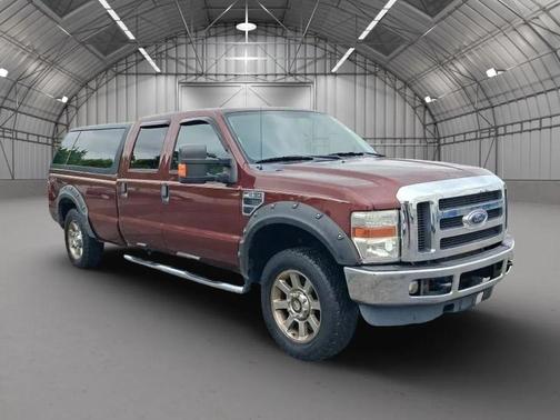 Red 2009 Ford F-250 FX4 Pickup 4D 6 3/4 ft