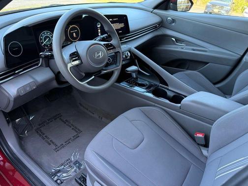 Ultimate Red Metallic 2024 Hyundai ELANTRA HEV Blue