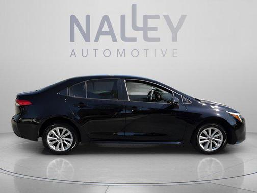 Midnight Black Metallic 2024 Toyota Corolla Hybrid SE