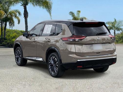 Baja Storm Metallic/Super Black 2024 Nissan Rogue Platinum
