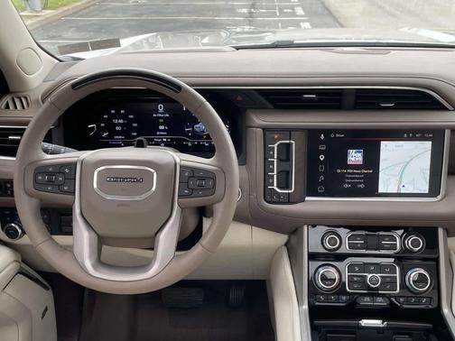 Tan 2024 GMC Yukon Denali