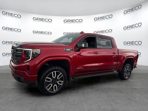 Volcanic Red 2025 GMC Sierra 1500 AT4