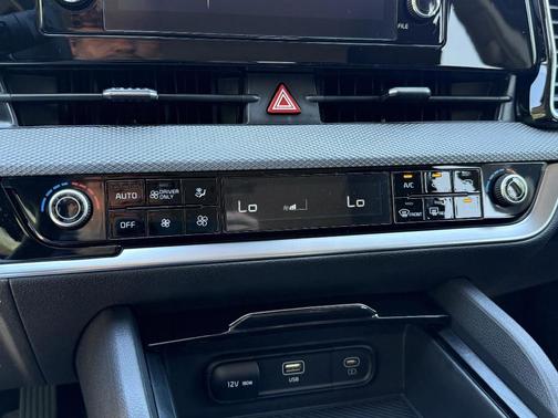 Fusion Orange 2025 Kia Sportage Hybrid LX