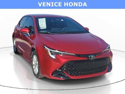 Red 2025 Toyota Corolla Hatchback SE