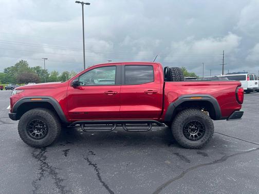 Volcanic Red Tintcoat 2024 GMC Canyon AT4X