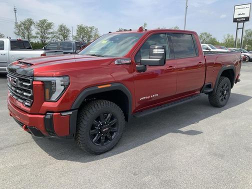 Volcanic Red Tintcoat 2026 GMC Sierra 3500 AT4