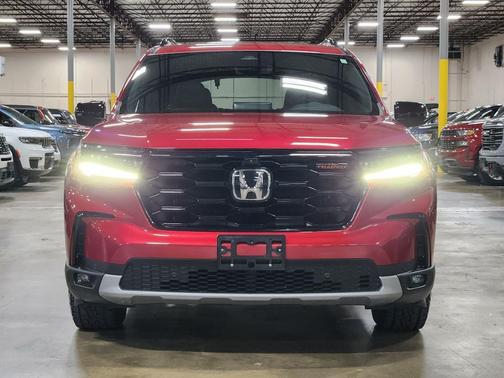 Red 2025 Honda Pilot TrailSport
