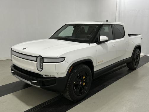Glacier White 2023 Rivian R1T Adventure Quad Motor Large Pack