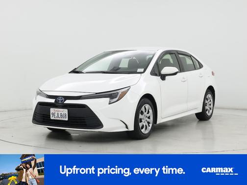White 2023 Toyota Corolla Hybrid LE