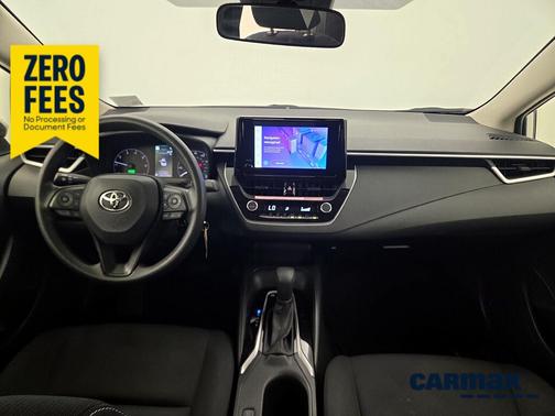 White 2024 Toyota Corolla Hybrid LE