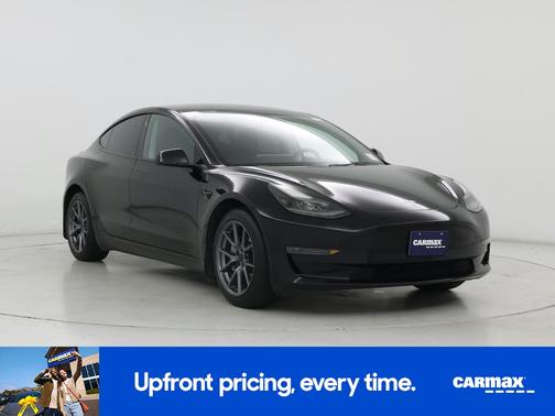 Black 2023 Tesla Model 3
