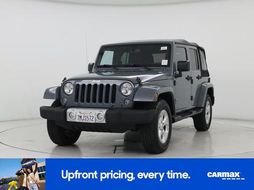 Gray 2015 Jeep Wrangler Unlimited Sahara