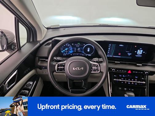Silver 2024 Kia Carnival SX