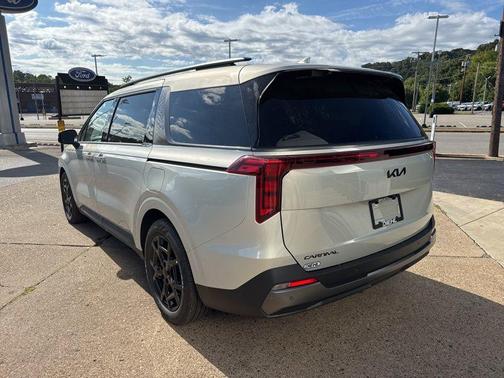 Ivory Silver 2026 Kia Carnival SX