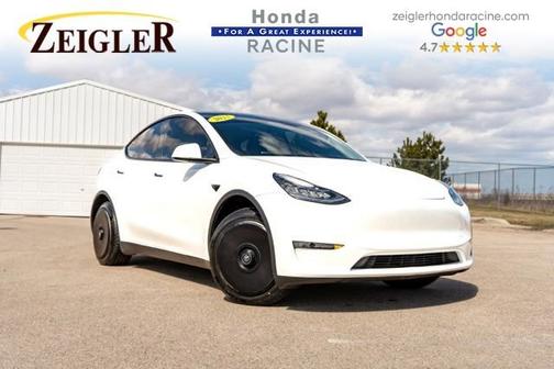 Solid Black 2023 Tesla Model Y Performance