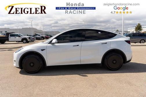 Solid Black 2023 Tesla Model Y Performance