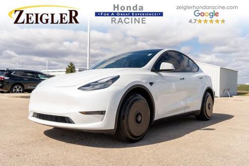 Solid Black 2023 Tesla Model Y Performance