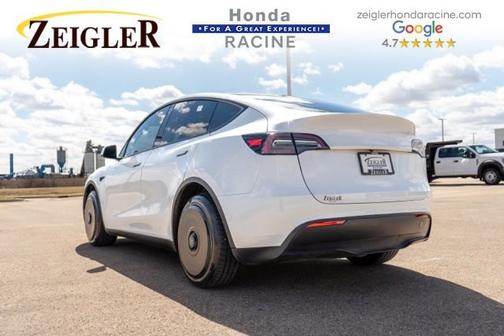 Solid Black 2023 Tesla Model Y Performance