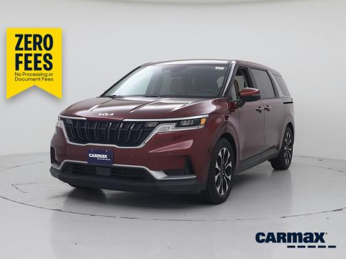 Red 2024 Kia Carnival EX