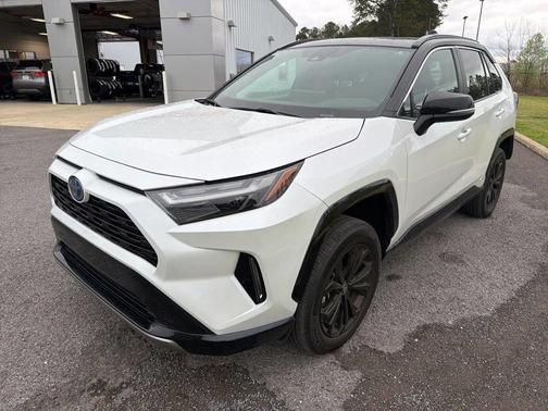 Wind Chill Pearl/Midnight Black Metallic 2024 Toyota RAV4 Hybrid SE