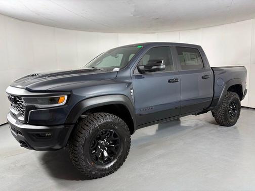 Forged Blue Metallic 2026 RAM 1500 RHO Crew Cab 4x4 5'7' Box