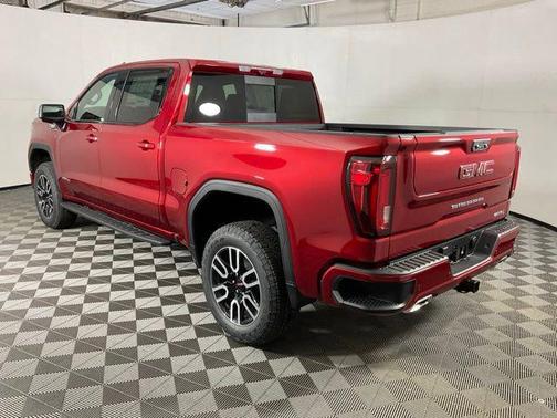 Volcanic Red Tintcoat 2026 GMC Sierra 1500 AT4