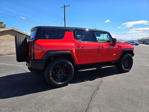 Orange 2025 GMC HUMMER EV SUV 2X